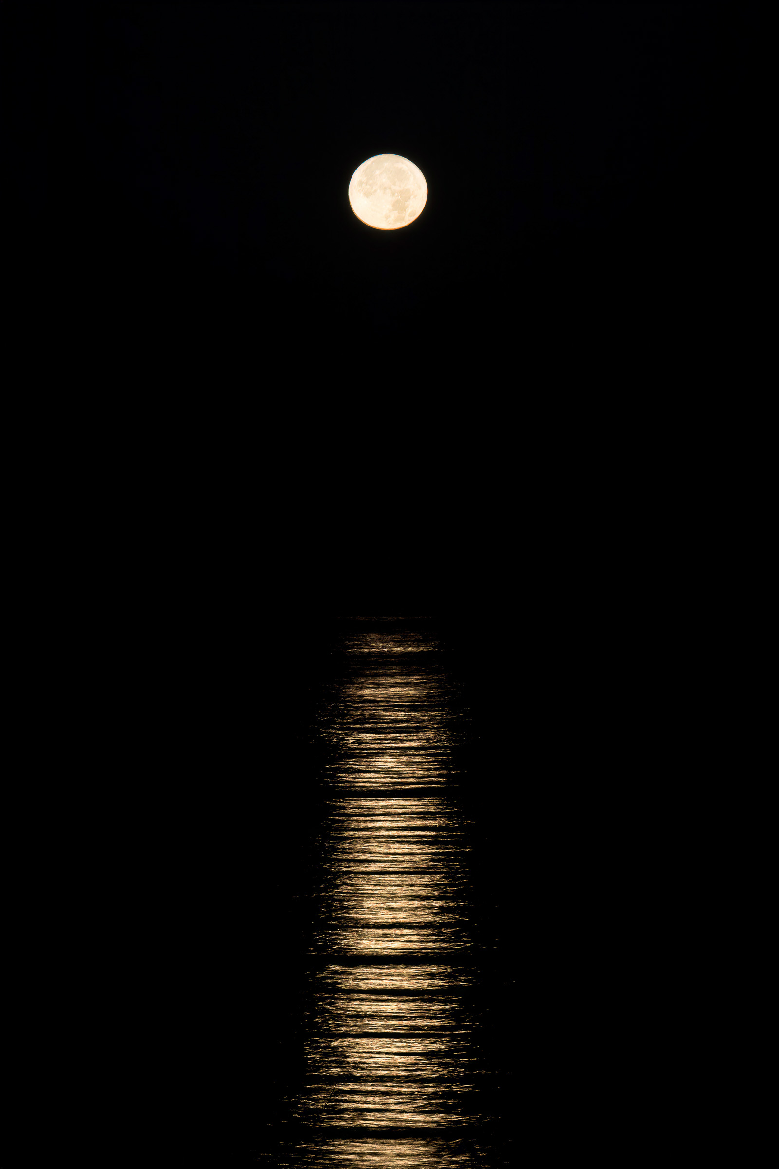 Supermoon reflecting across Little Traverse Bay